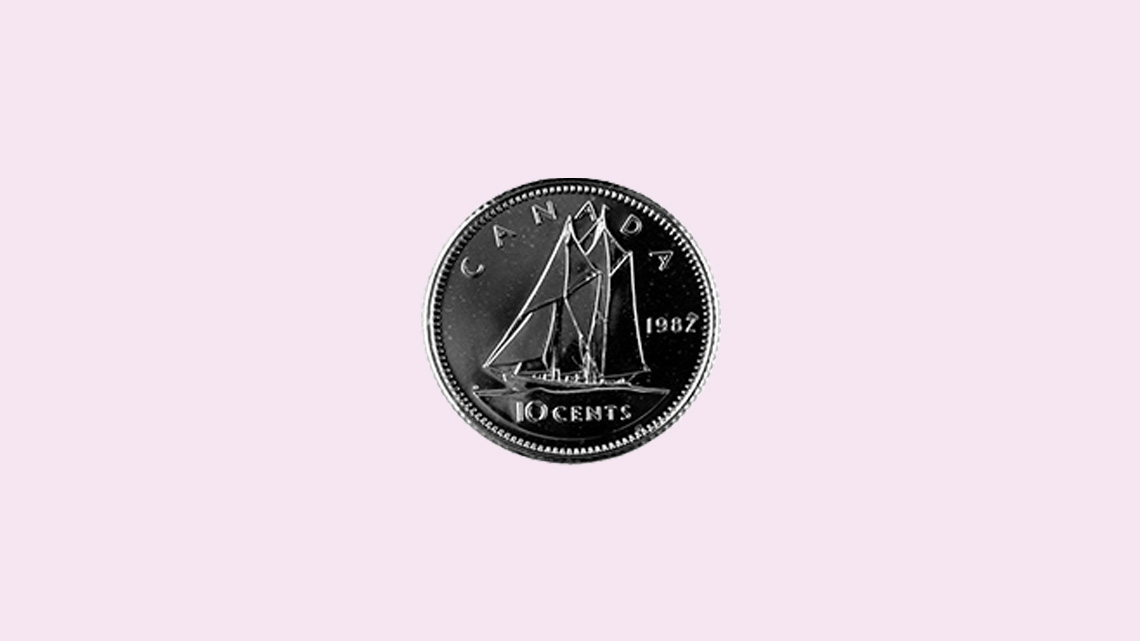 A&nbsp;silver-coloured coin with a&nbsp;fishing vessel. This&nbsp;is a ten cent coin called a dime.