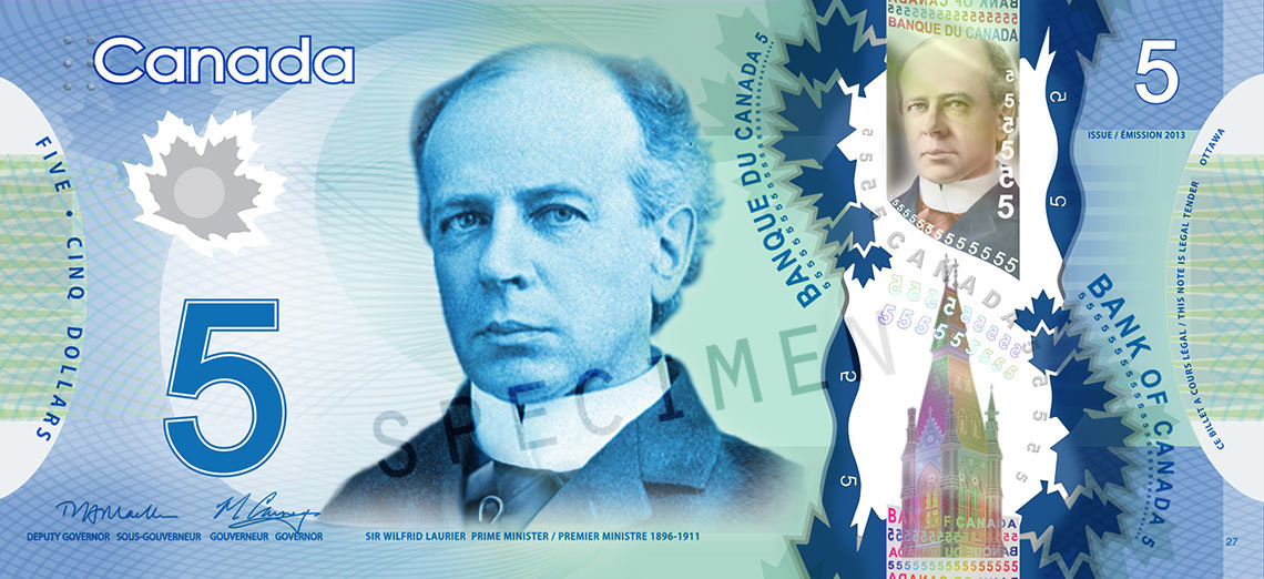 A blue bill with the number five on it. This is a Canadian five-dollar bill.